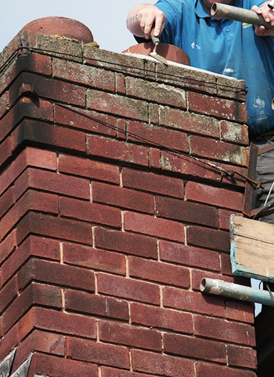 Repairing flashing on a chimney